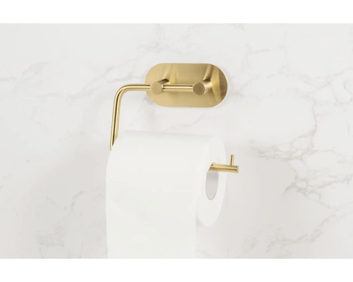 Suport metalic pentru hârtie igienică cu rolă de hârtie pe un perete