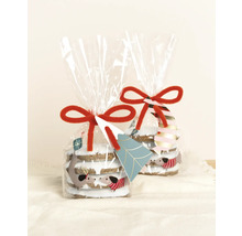 Două pungi cu biscuiți de Crăciun, decorate cu motive de teckel și fundă roșie