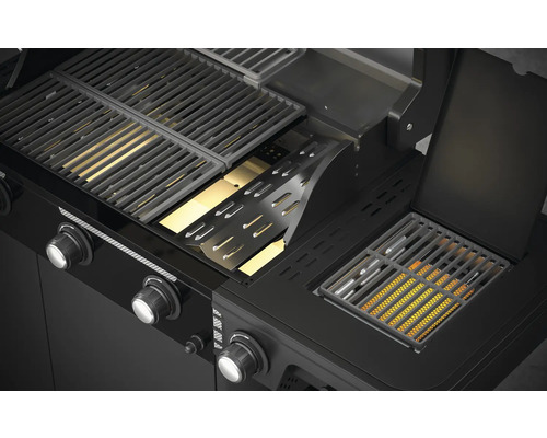 Imagine detaliată a unui grătar pe gaz cu grătar și elemente de control