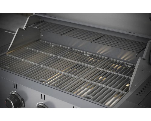 Vedere interioară a unui grătar cu grătar de gătit și grătar de menținere la cald