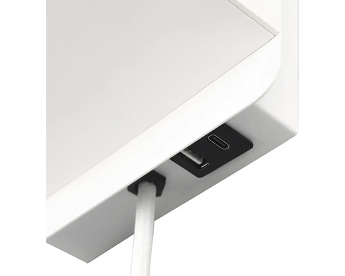 Detaliu al unei piese de mobilier cu porturi USB și USB-C și trecere pentru cablu