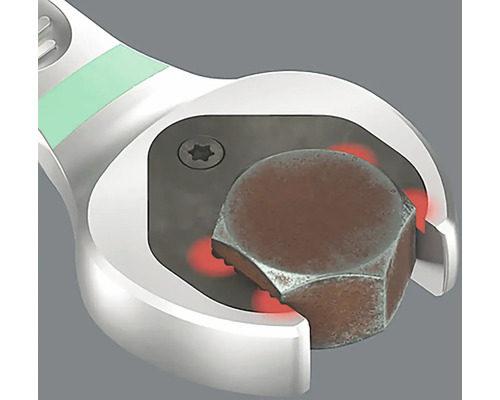 O cheie fixă apucă un șurub.