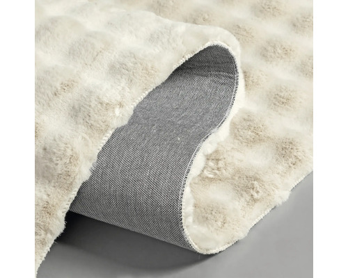 Covor cu suprafață cu fibre și spate din material textil