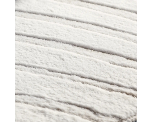 Prim-plan cu un covor alb texturat