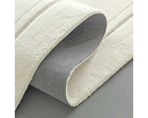 Imagine detaliată a unui covor alb cu structură