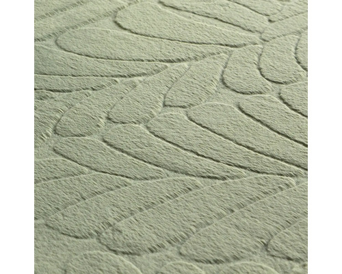 Prim-plan cu un covor cu motiv de frunze