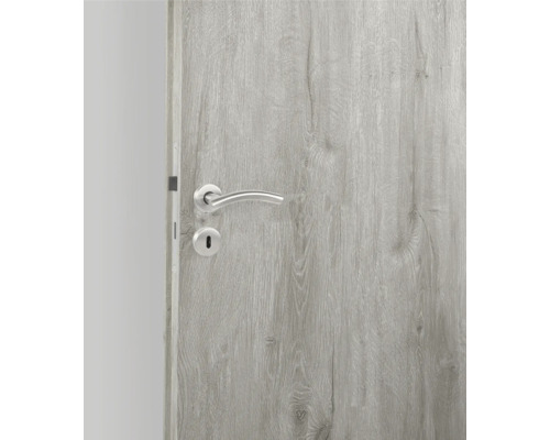 Ușă de interior cu aspect de lemn și mâner