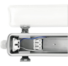 Vedere interioară a unui corp de iluminat fluorescent tubular cu carcasă deschisă pentru a vedea componentele electrice