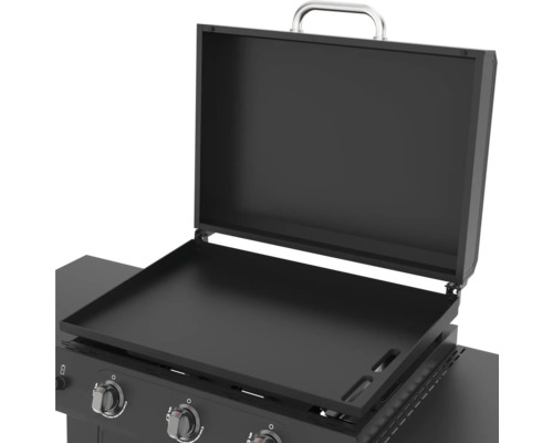 Plită deschisă cu capac și elemente de control.