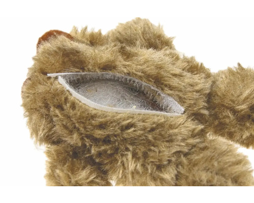 Prim-plan cu un ursuleț de pluș cu fermoar și umplutură