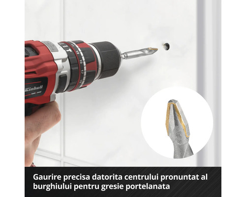 Mașină de găurit Einhell care găurește o gaură într-o faianță albă