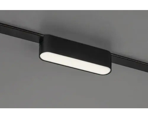 Spot negru pe șină pe o șină