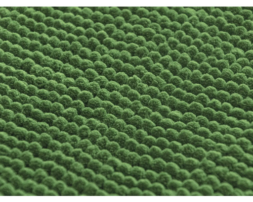 Prim-plan al unui covor șenil verde