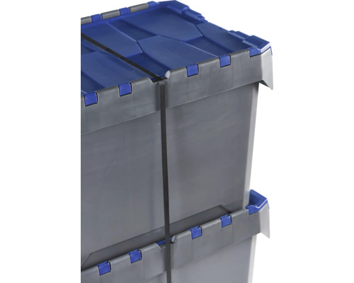 Două cutii din plastic gri cu capac albastru și curea de tensionare stivuite
