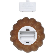 Compartimentul pentru baterii al unei lumini decorative în formă de biscuiți