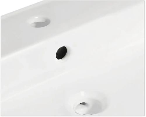 Prim-plan cu o chiuvetă cu preaplin