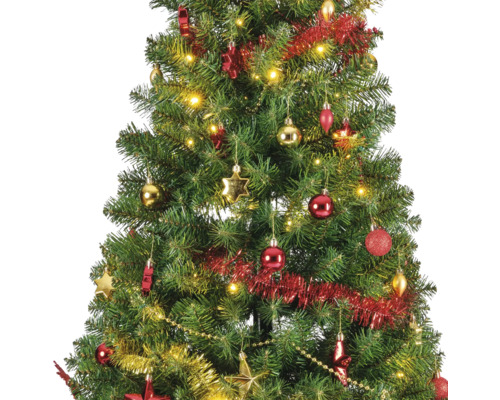 Pom de Crăciun împodobit cu lumini, ghirlande și globuri