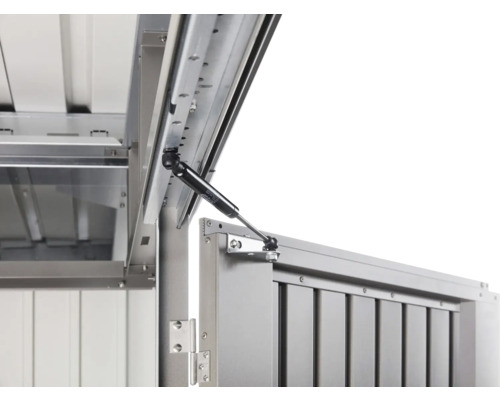 Prim-plan cu amortizorul cu gaz pe o construcție metalică