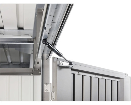 Prim-plan cu un amortizor cu gaz pe o cutie de scule.