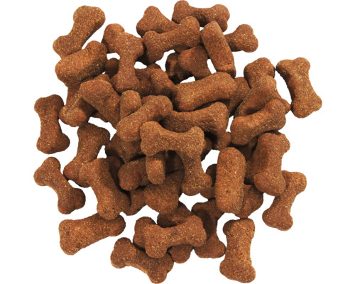 Hrană maro pentru câini în formă de os