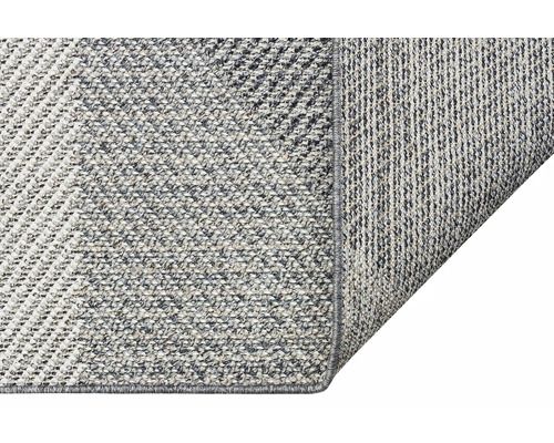 Imagine detaliată a unui covor țesut