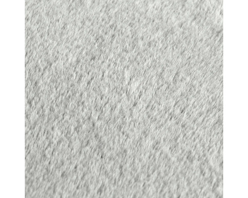 Prim-plan al unei suprafețe de covor gri