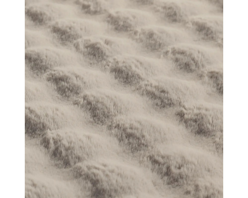 Prim-plan al unui covor reliefat