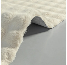 Prim-plan al unui covor cu fibre textile