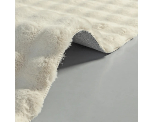 Prim-plan al unui covor cu fibre textile