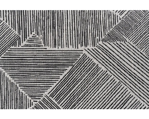 Vizualizare detaliată a unui covor cu model cu design grafic