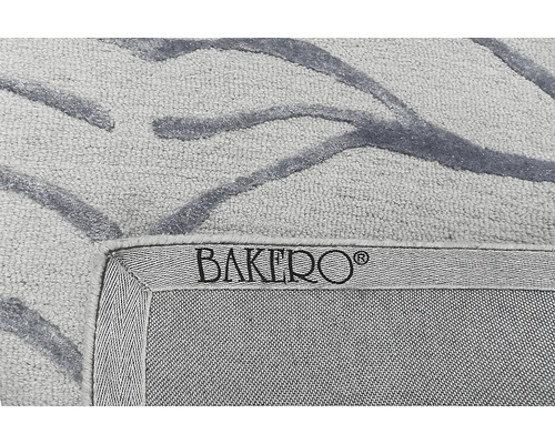 Covor cu model abstract și logo Bakero