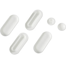 Mai multe capsule și pastile albe