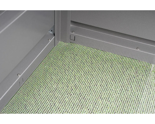 Detaliu al unei căsuțe de grădină cu podea tip grilaj