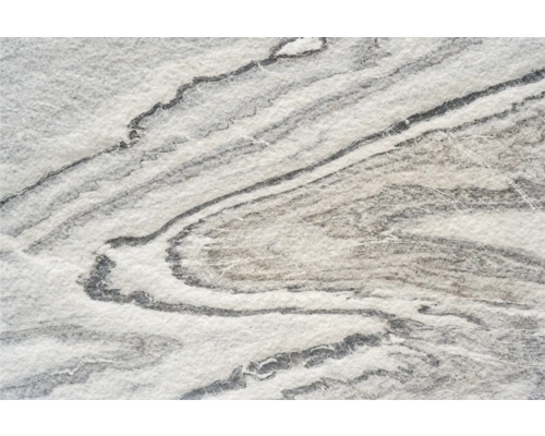 Prim-plan al unei plăci de marmură cu vinișoare gri