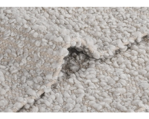 Prim-plan cu un covor cu structură buclată