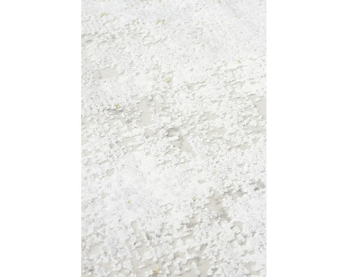 Prim-plan cu o suprafață albă texturată