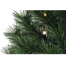 Prim-plan cu un pom de Crăciun artificial cu iluminare