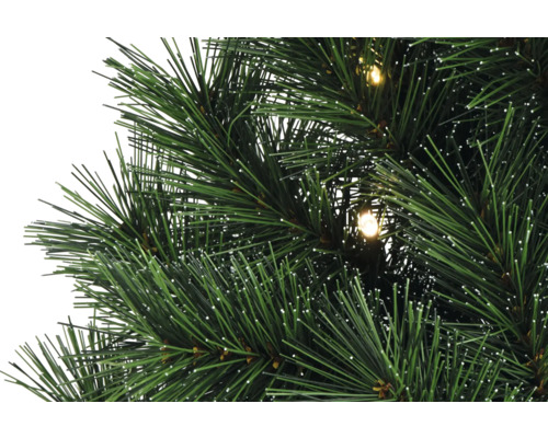 Prim-plan cu un pom de Crăciun artificial cu iluminare