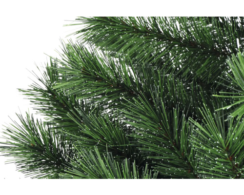 Prim-plan cu un pom de Crăciun artificial cu ace verzi