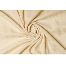 Prim-plan cu o bucată de material textil cu model în spirală