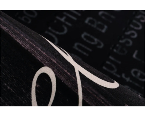 Prim-plan al unei bucăți de material textil cu imprimeu