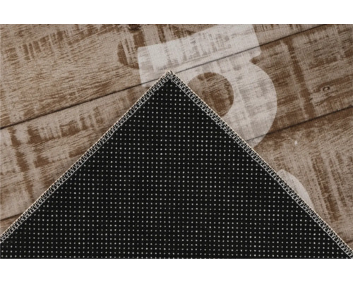 Imagine detaliată a unui covor cu motiv de scânduri de lemn și cifră