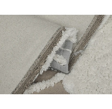 Imagine detaliată a unui covor cu franjuri