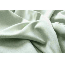 Prim-plan cu o mostră de material textil.