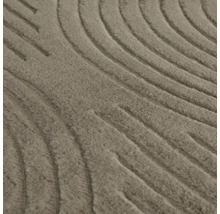 Prim-plan al unui covor cu model în relief