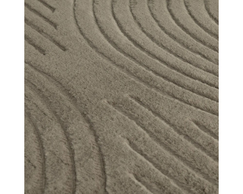 Prim-plan al unui covor cu model în relief