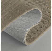 Covor cu model structurat și spate din material textil