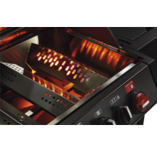 Vedere interioară a unui grătar cu zonă turbo activă