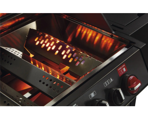 Vedere interioară a unui grătar cu zonă turbo activă