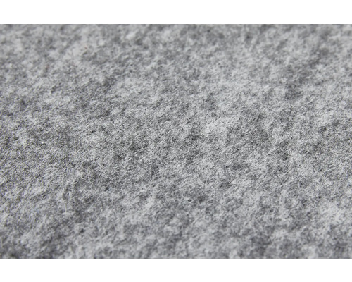 Vedere de aproape a texturii unei pâsle de protecție gri.